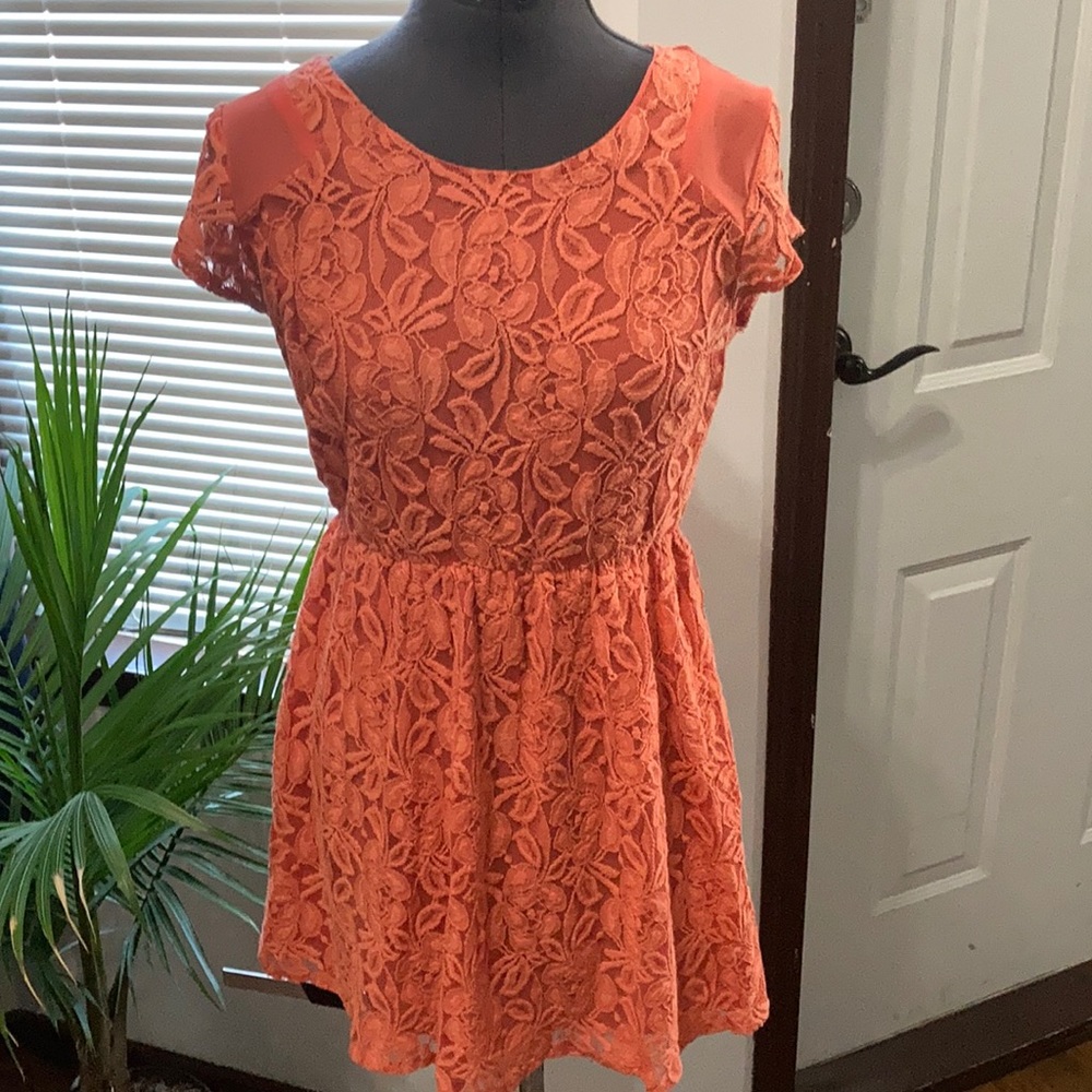 The cutest darn salmon pink lace dress!